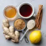 Ingredients for making Brazilian Mounjaro detox drink on kitchen counter.