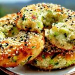 Close-up of delicious Easy Zucchini Bagels with Almond Flour, topped with sesame and black seeds.